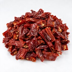 Cut dried red chillies with natural wrinkled skin and visible seeds supplied by PROMA Malaysia